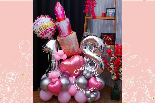 The pink and silver balloons are a rare but perfect bouquet combination