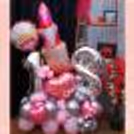 The pink and silver balloons are a rare but perfect bouquet combination