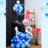 The blue and silver helium balloons on the bouquet are an outstanding addition