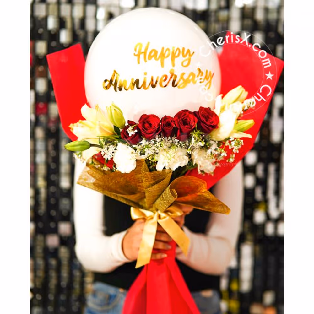 Romance this anniversary with this elegant bouquet of flowers and balloons