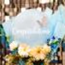 The silver butterfly is the cream point in the bouquet