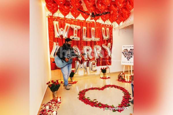 Make your proposal romantic by booking CherishX Romantic Marry Me Balloon Decor!