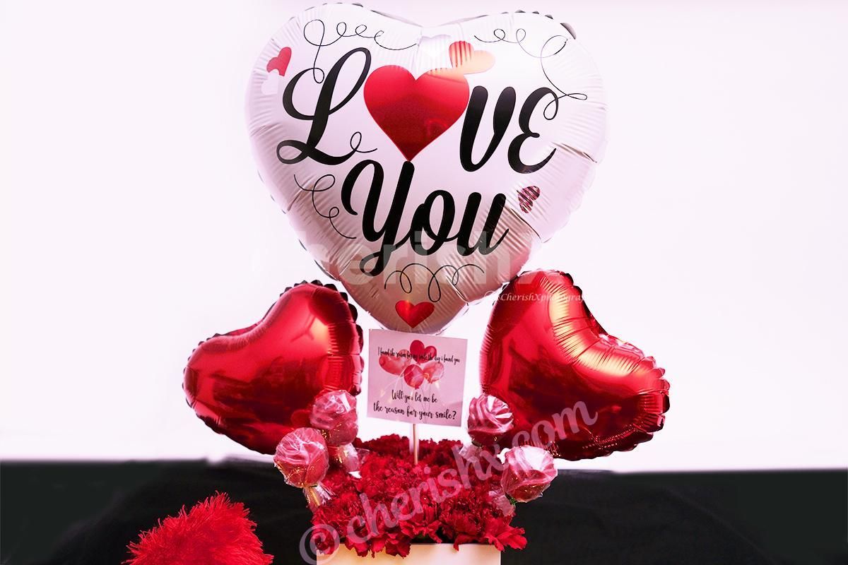 Celebrate your Valentine's Day perfectly with this charming White & Red Colored Rose Day Bucket!