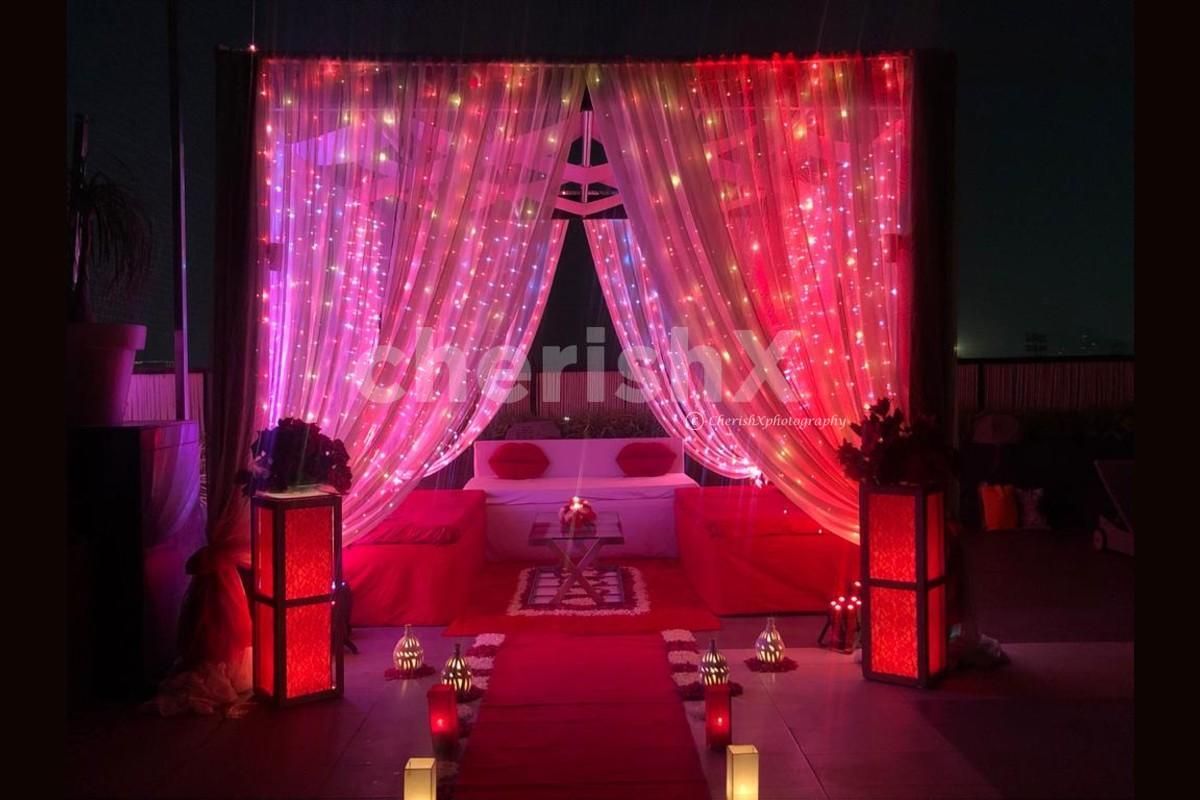 Exquisite poolside cabana setup with candlelight and romantic décor
