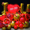 The red and golden balloon combination is a priceless addition to the hamper