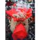 The balloon bouquet is unique with flowers and added accessories