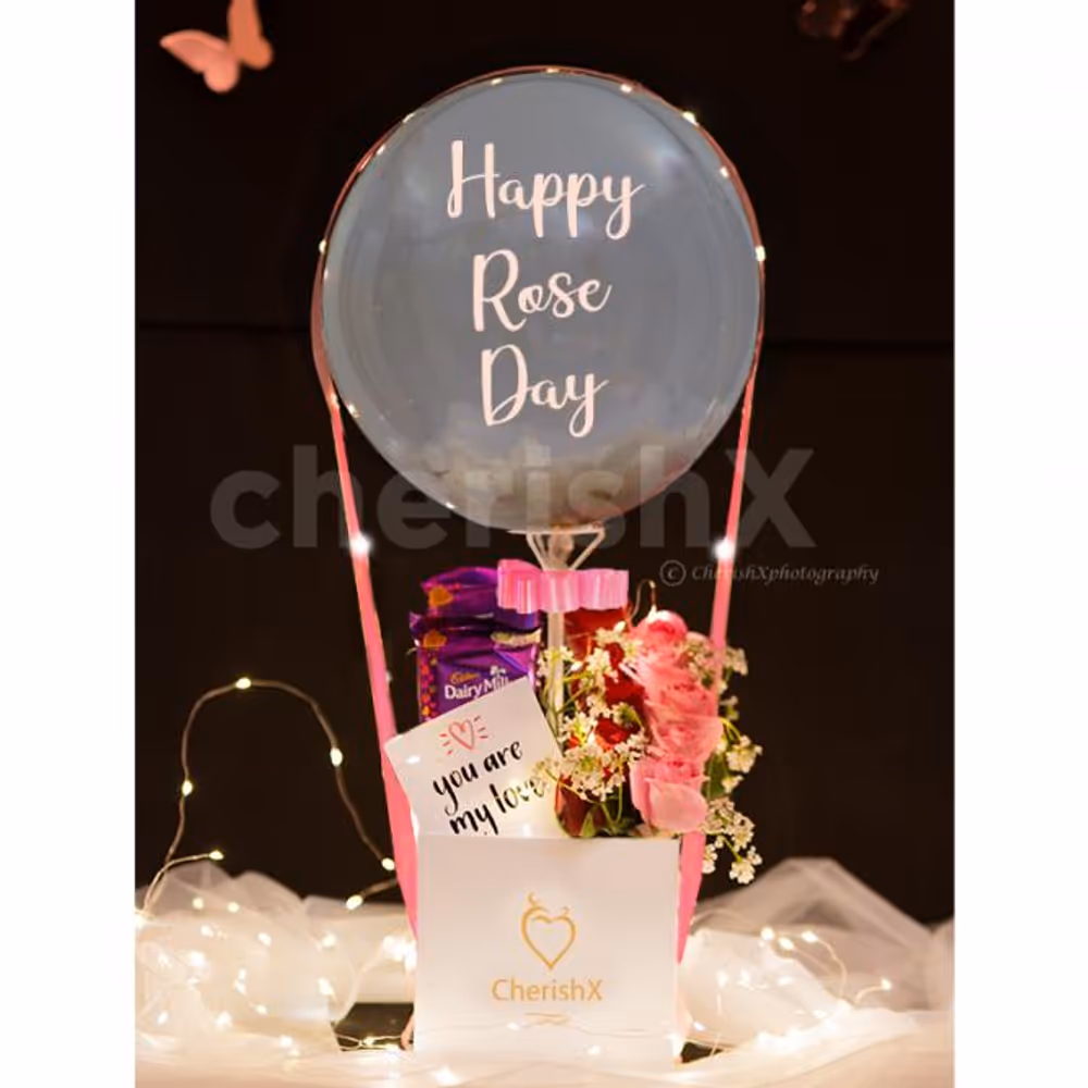 Get a beautiful Candy Flowers Balloon Bucket for your special one.