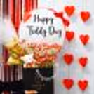 Red flower teddy balloon bucket for a romantic gift surprise
