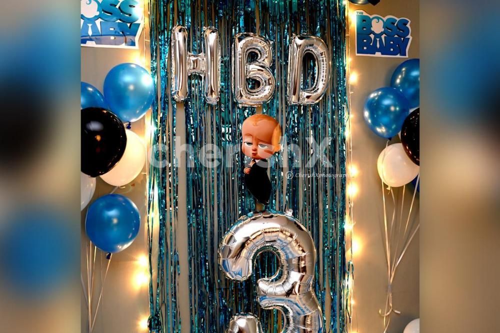 A simple Boss Baby Themed Balloon Decoration for a Kid's Birthday