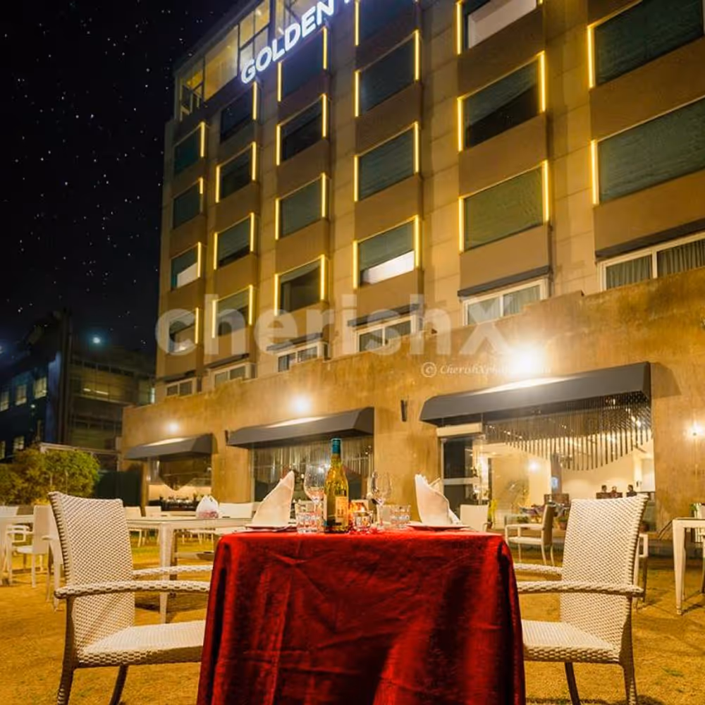 The decorated table with flowers and candles are enriching for the evening.