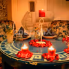 The decorations with roses and candles set the romantic vibe.