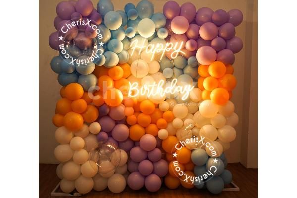 Add a new element of pastel and blue pastel balloons to tour birthday décor