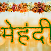 Celebrate Mehndi in style with stunning flowers and lanterns setup
