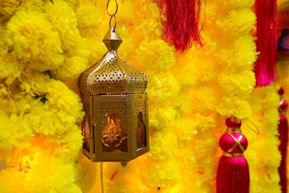 Pink and yellow flowers add a beautiful and romantic touch to your haldi and mehndi celebrations