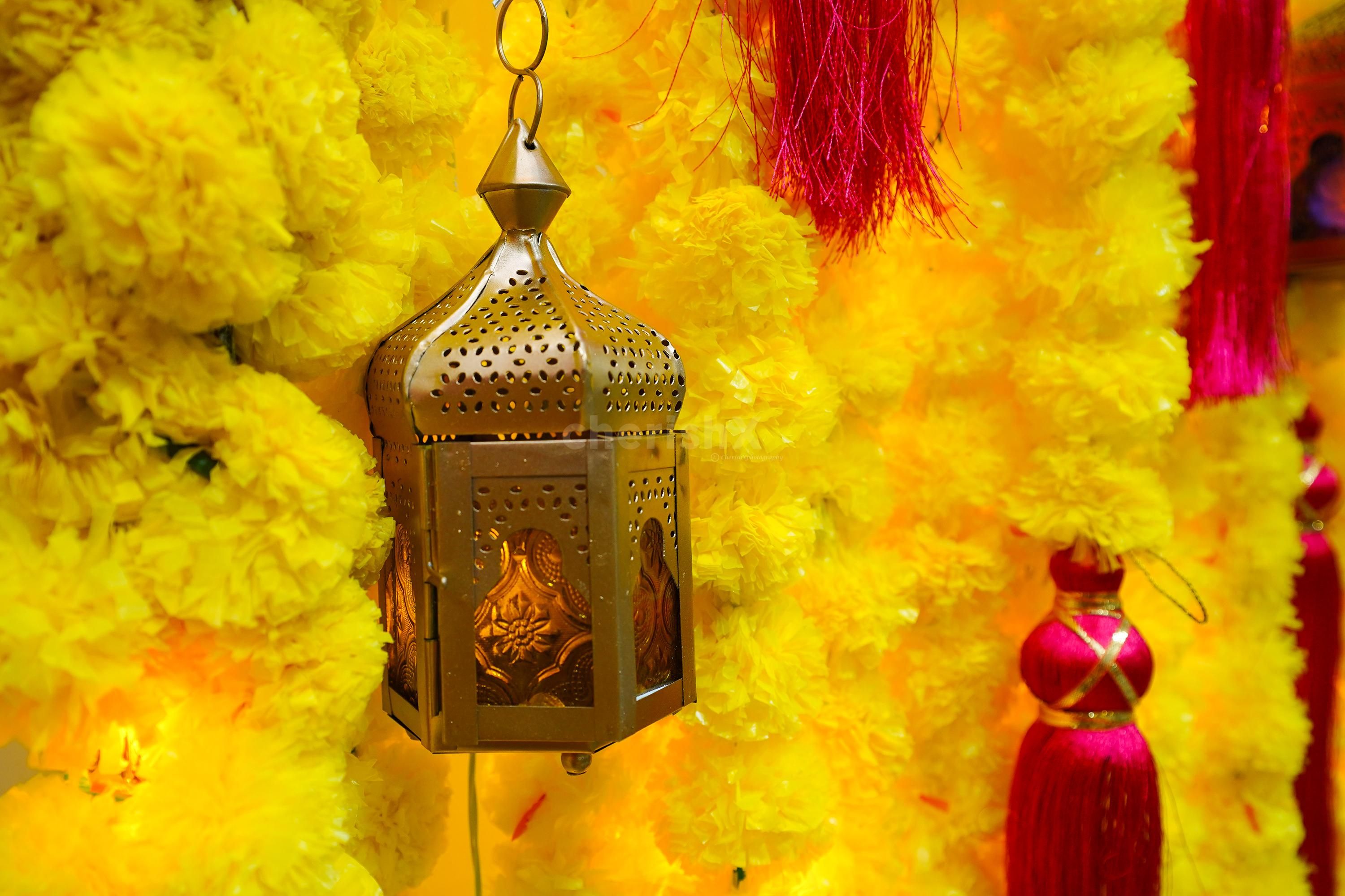 Pink and yellow flowers add a beautiful and romantic touch to your haldi and mehndi celebrations
