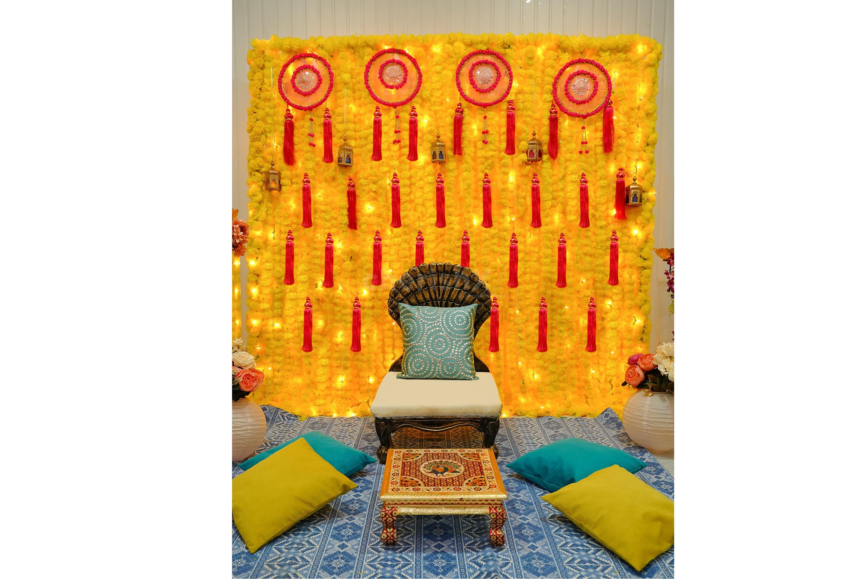 Create a stunning flower wall with our pink and yellow flower décor, perfect for pictures too