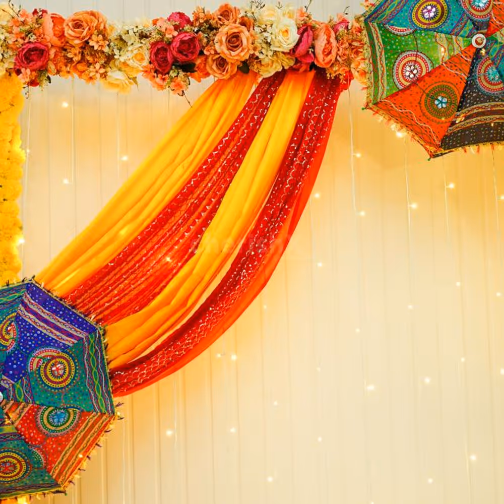 The mehndi or haldi celebration cannot be simple if you have the umbrella décor