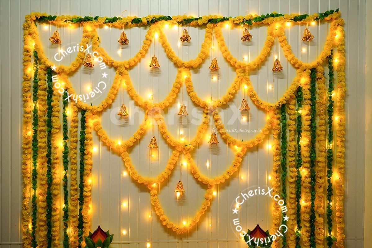 Dance to the tunes of wedding ceremonies with elegant Haldi/Mehndi décor by CherishX.