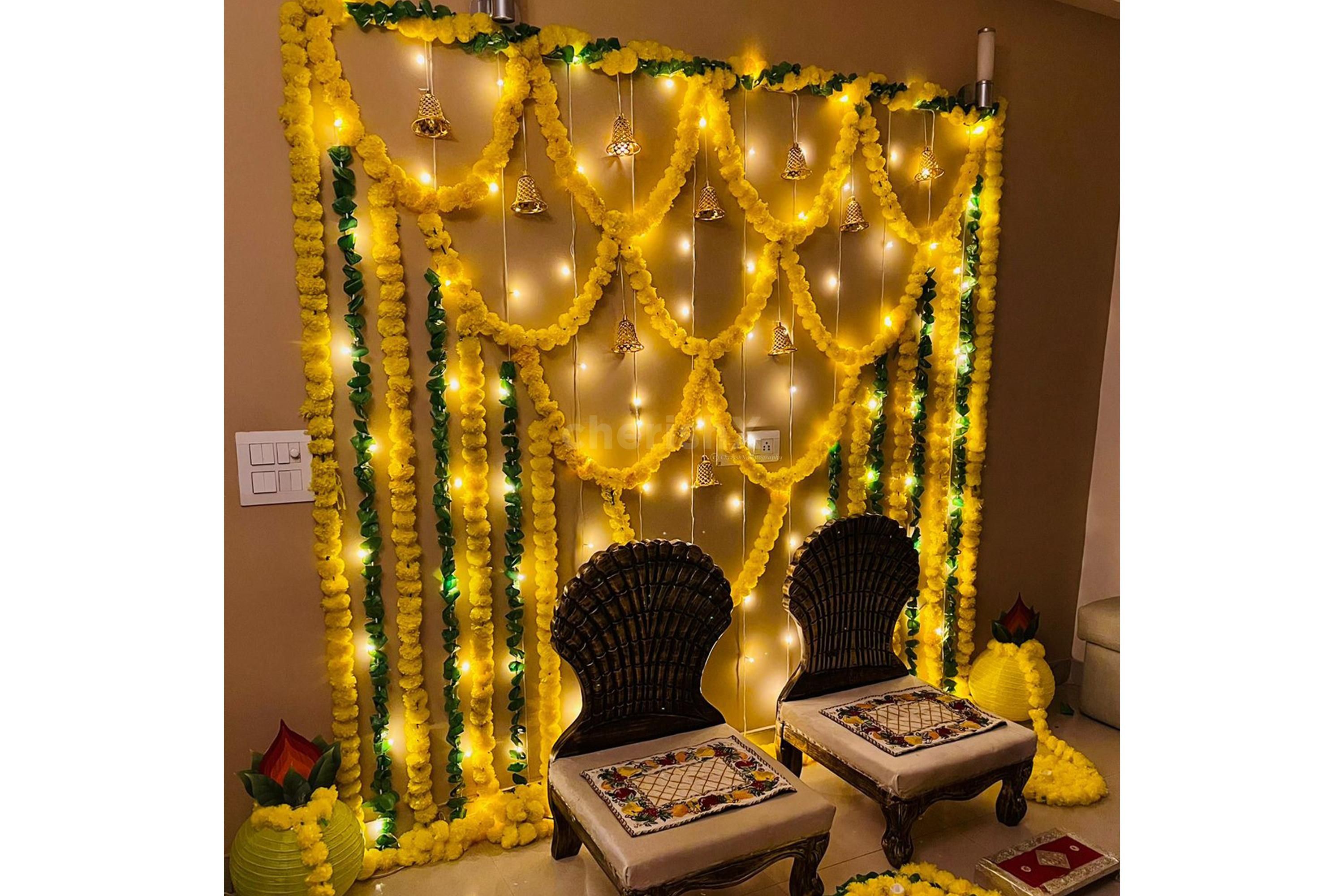 Dance to the tunes of wedding ceremonies with elegant Haldi/Mehndi décor by CherishX.