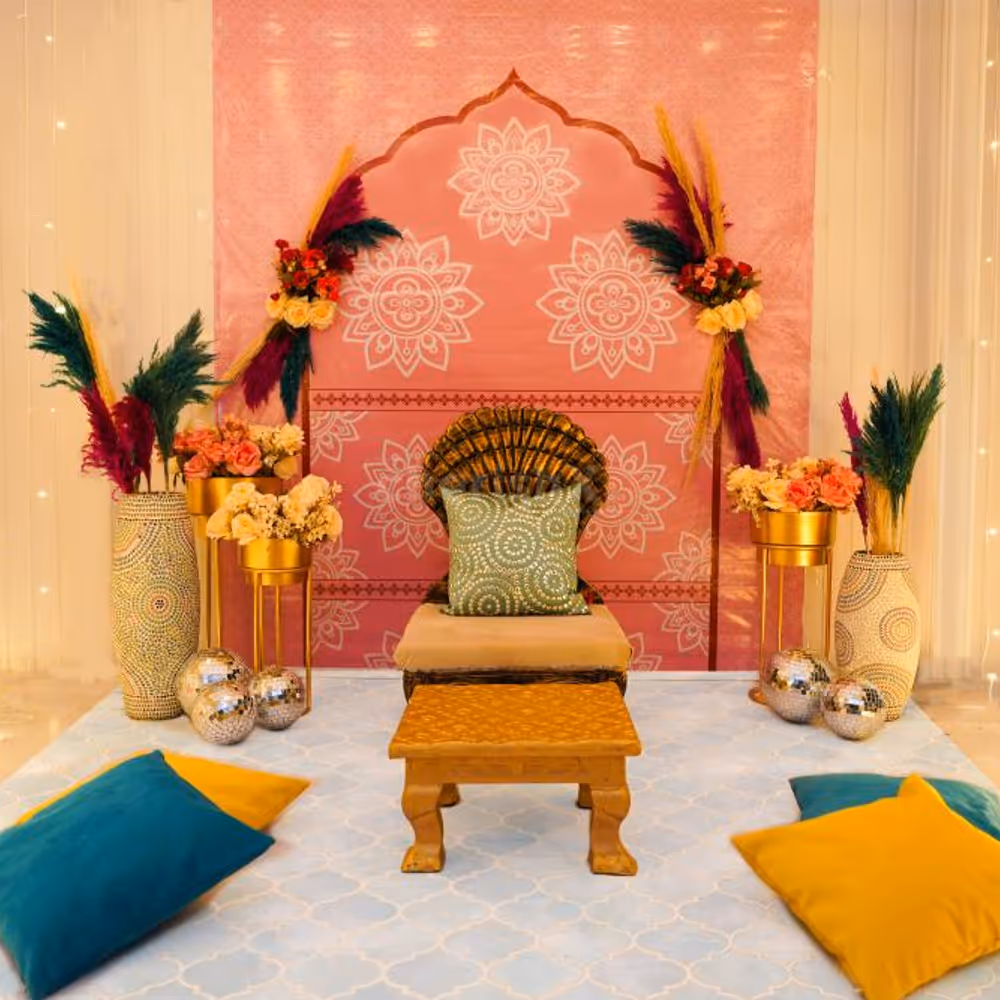 The pink and white textured colours on the backdrop are perfect for the Haldi and Mehndi ceremonies