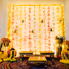 The artificial yellow garlands draped with pixel lights make it an attractive backdrop