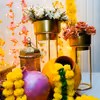 The colourful hanging backdrop infuses your celebration with colour and happy vibes