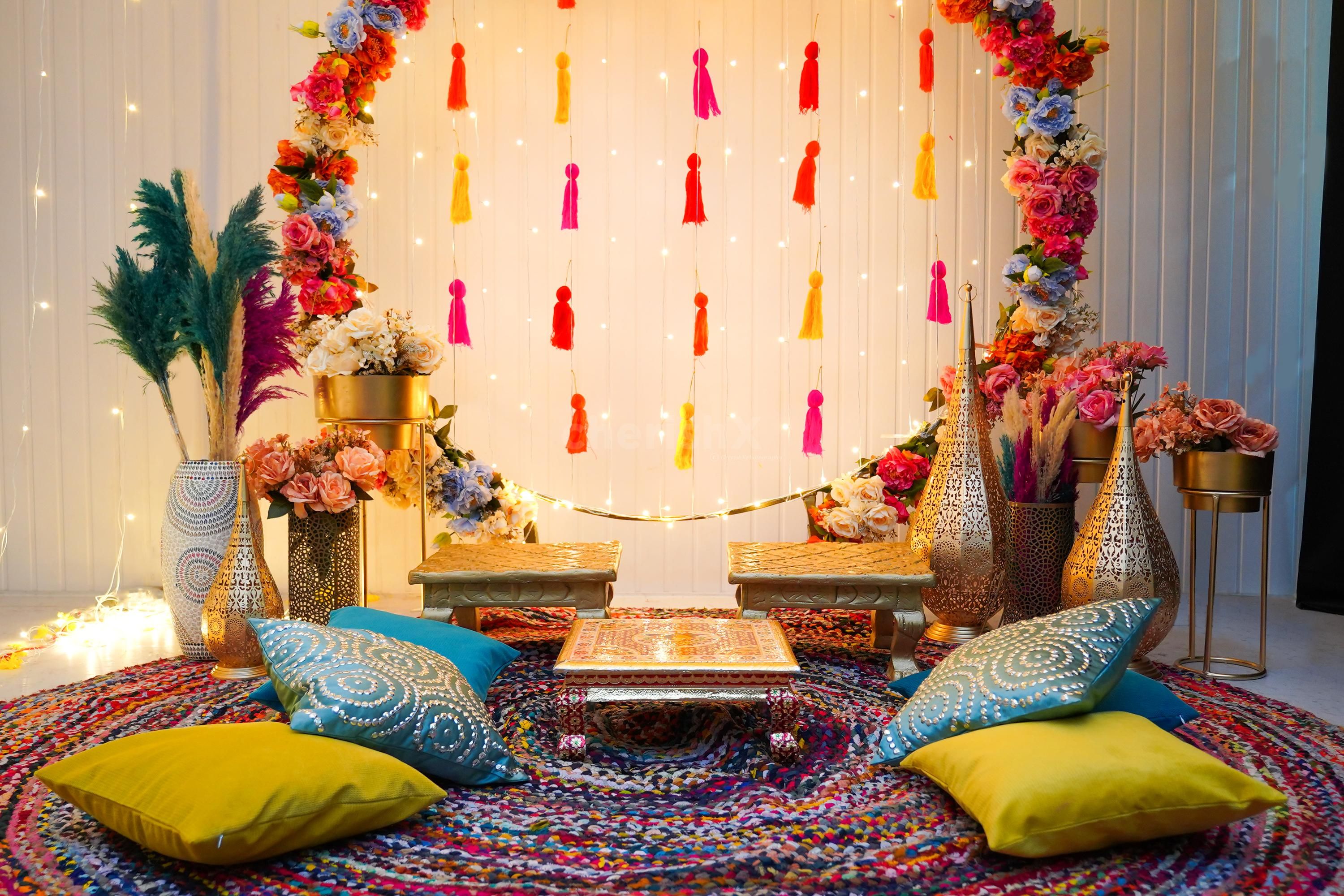 Our colourful contrasting décor setup of Vibrant mehndi decoration will