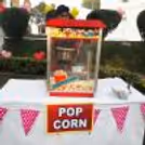 A popcorn counter provides a fun and tasty snack option at their birthday party