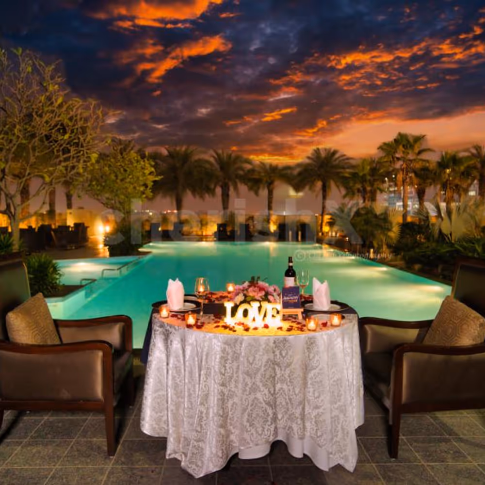 The area is decorated with flowers and light, especially for your Valentine’s evening