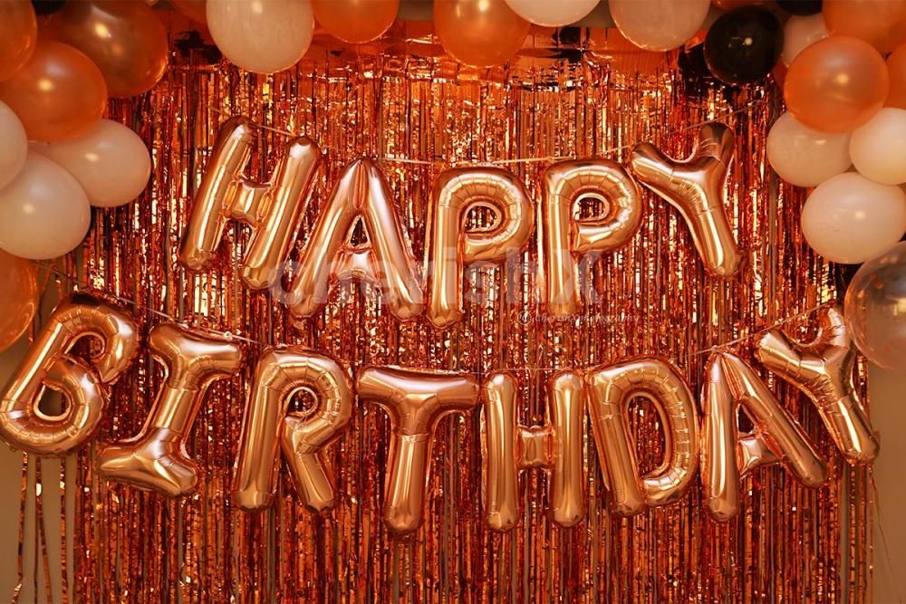 Rose Gold Happy Birthday Foil Balloons to enhance the room decor.