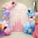 The pastel balloon decoration uplifts the mood of the venue.