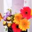 The back bucket with a colourful mix of items makes it a stylish present for your mother.
