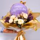 The flower arrangements make it beautiful and pleasant in the bouquet