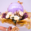 The lavender balloons decorated with golden ribbons make it gorgeous