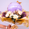 The lavender balloons decorated with golden ribbons make it gorgeous
