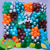 The leaves, boards, and balloons will create a thrilling Jurassic World ambience for the party