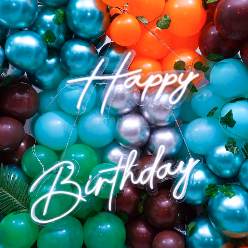 The icing on the cake is the bespoke "Happy Birthday" neon sign.