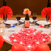 The heart-shaped balloons and candles set the perfect vibe for the romantic dinner night