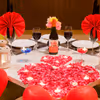 The heart-shaped balloons and candles set the perfect vibe for the romantic dinner night