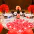 The heart-shaped balloons and candles set the perfect vibe for the romantic dinner night