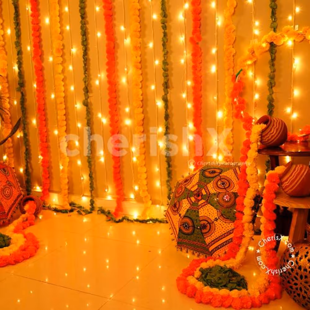 A Festive Umbrella and Flower Garlands Decor curated especially for your Diwali Celebrations!