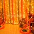 A Festive Umbrella and Flower Garlands Decor curated especially for your Diwali Celebrations!