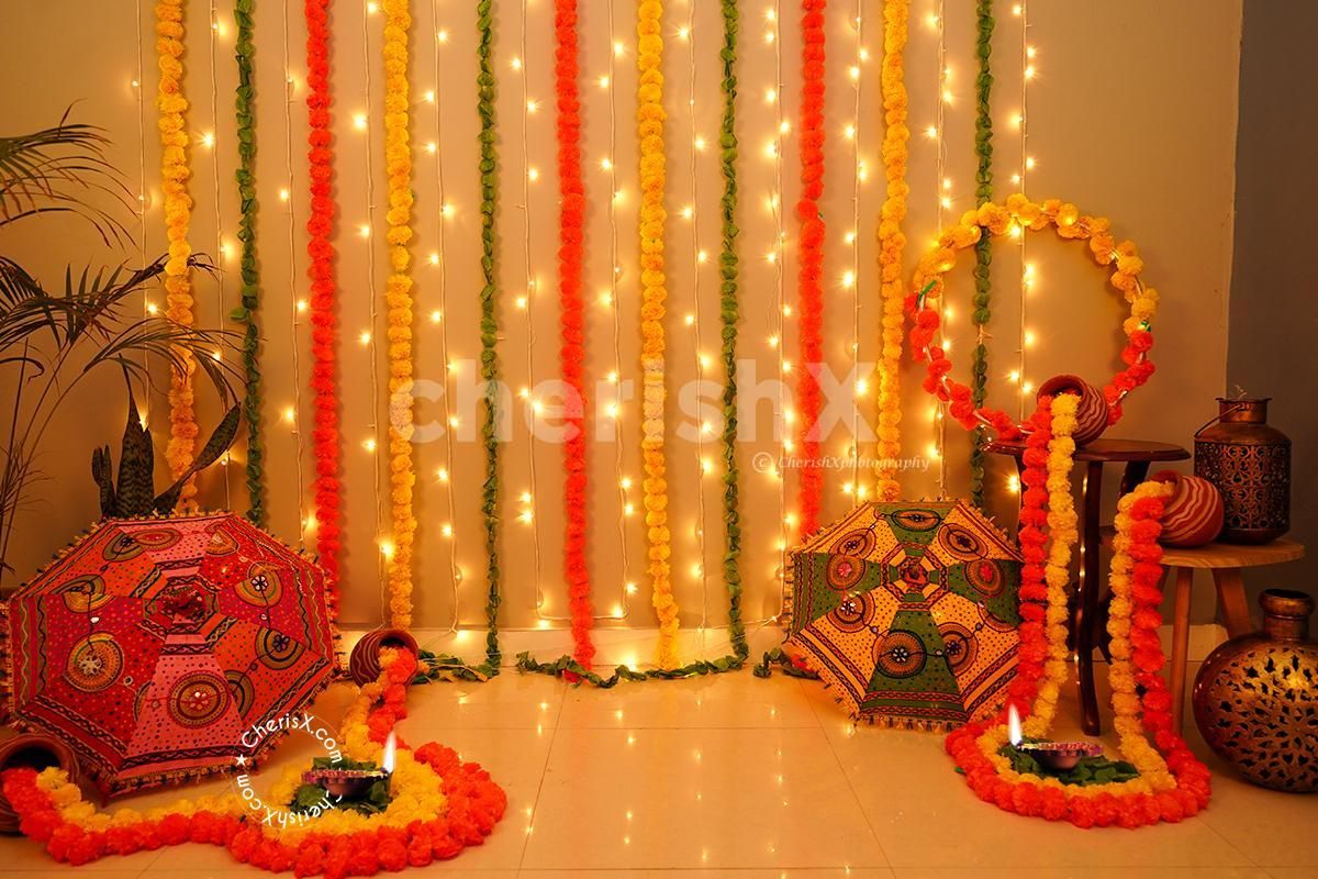 Get wall decorations for your home or room by booking CherishX's Umbrella and Flower Garlands Decor!