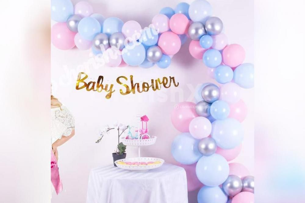 2. Make your baby shower celebration memorable by adding a pastel balloons baby shower decor!