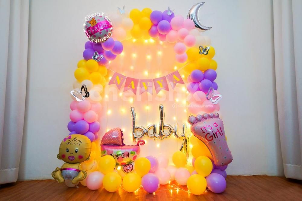 Pastel themed Annaprashan decor by CherishX.