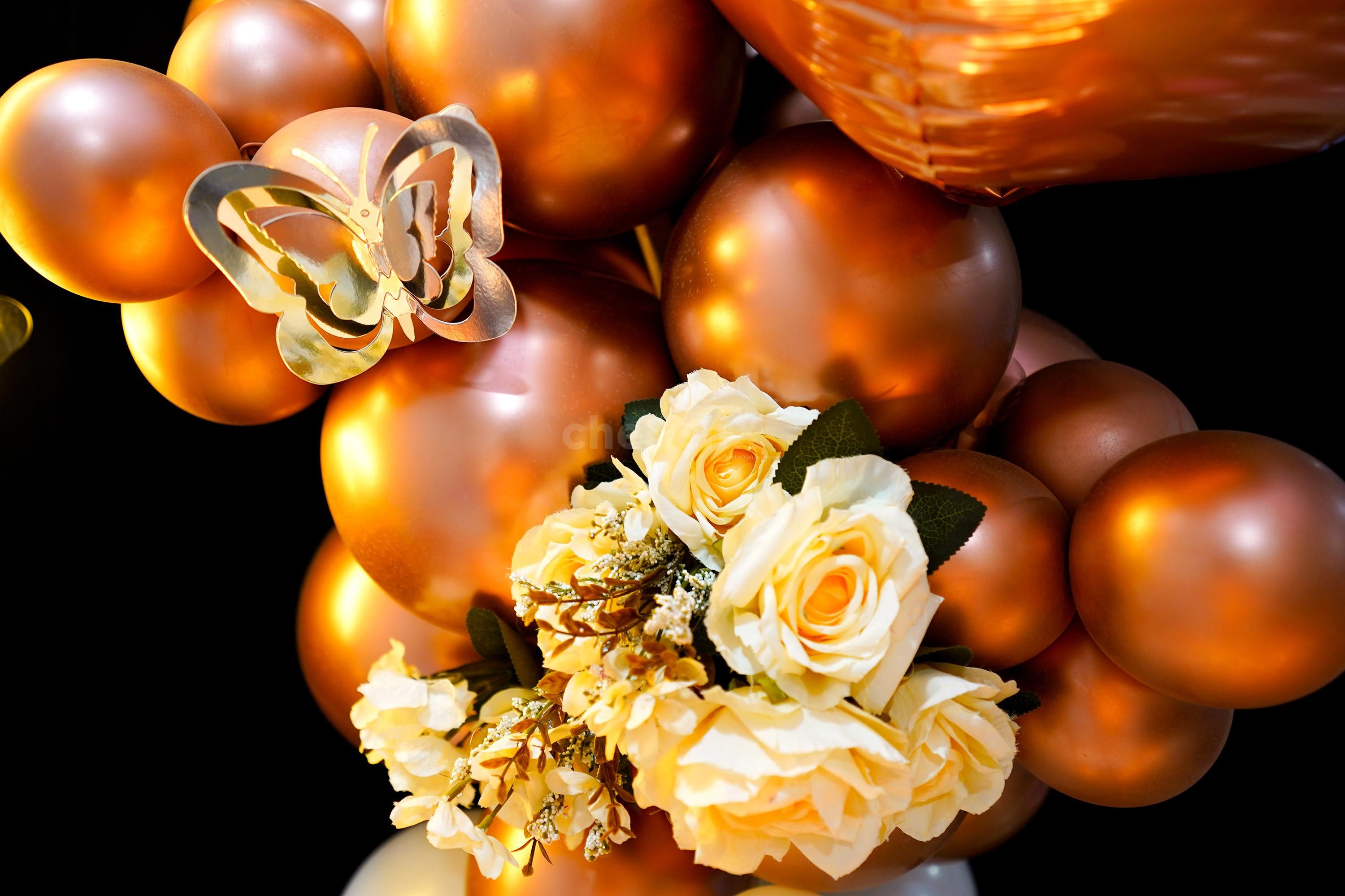 This balloon backdrop decoration will set the perfect vibe for a birthday occasion.