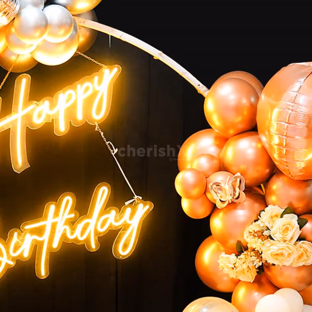 This dreamy metallic ring backdrop is adorned with silver and rose gold balloos.