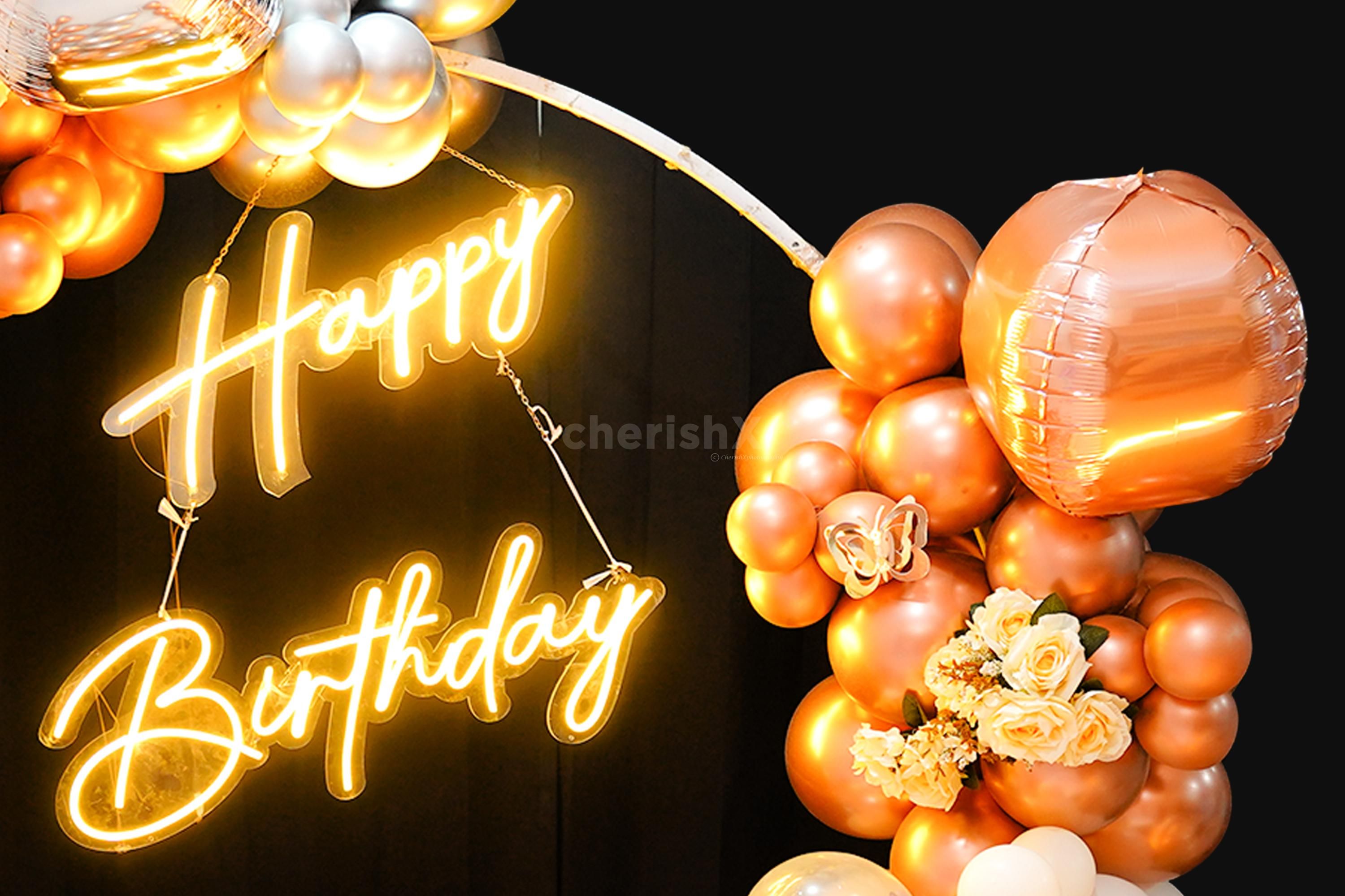This dreamy metallic ring backdrop is adorned with silver and rose gold balloos.
