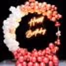 Add a touch of magic to your special day with our stunning rose gold and white balloon backdrop.