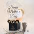 The bucket in a black box decorated with stunning items looks attractive and elegant